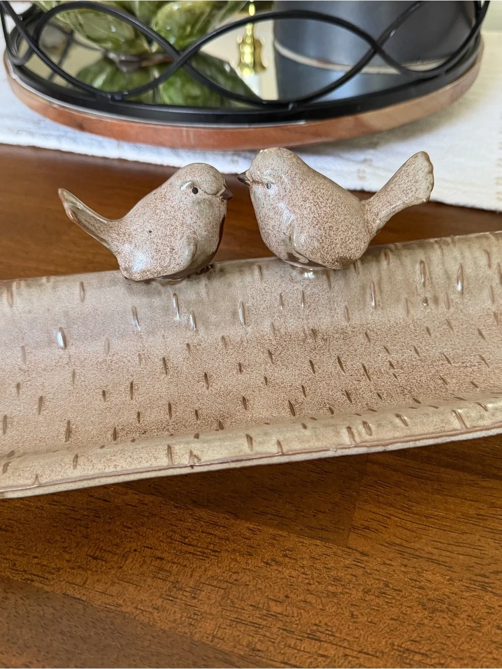 Ceramic bird feeder/tray.